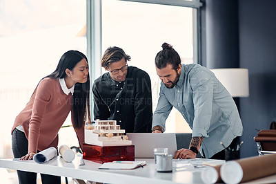 Buy stock photo Architect, team and meeting with laptop for design, planning or brainstorming for construction at office. Group of creative employees or civil engineers in discussion on computer for building startup