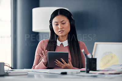 Buy stock photo Graphic designer, woman and tablet with headphones in office on digital, social media and connection. Asian, female person and creative on tech and application in workplace for business or company