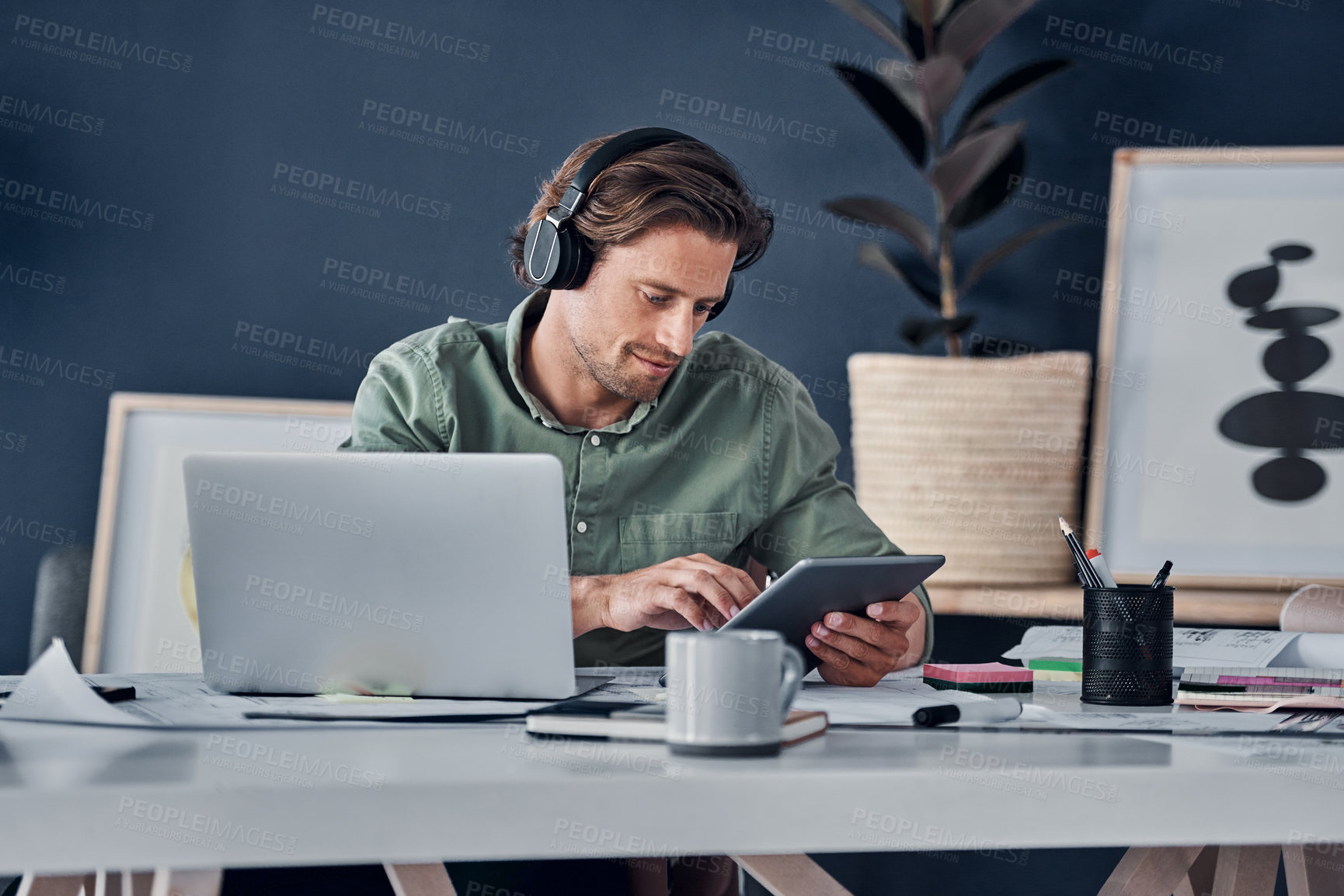 Buy stock photo Music headphones, tablet and business man in office streaming radio podcast. Technology, professional and male person listening to audio, sound or song, online browsing or social media, email and app