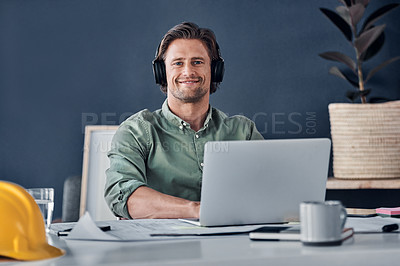 Buy stock photo Laptop, headphones and portrait of architect man in office streaming radio podcast. Face, music and male engineer listening to audio, sound or happy song, web browsing or social media on pc mockup.