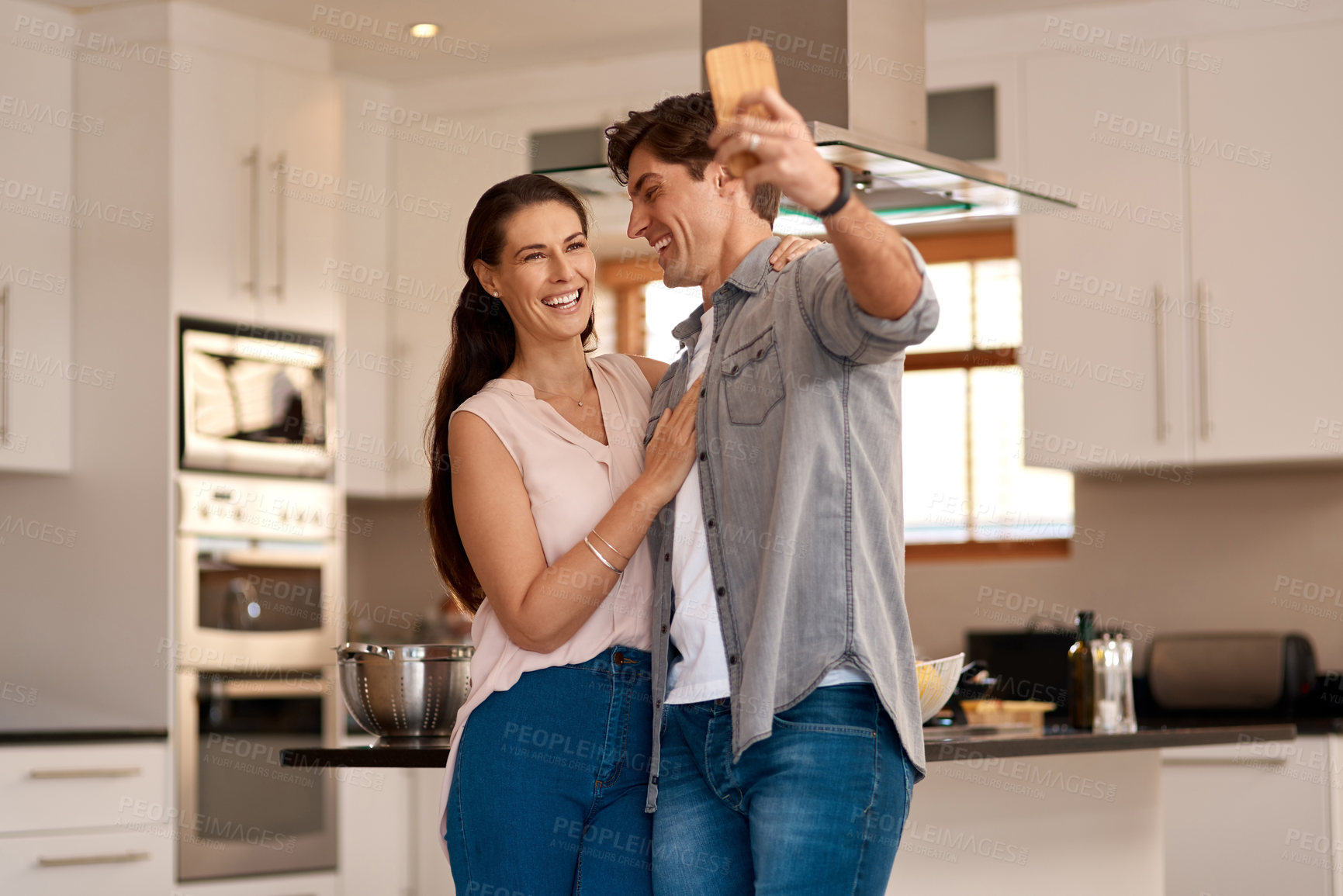 Buy stock photo Couple, home kitchen and selfie with phone for profile picture together, social media post and digital gallery. Apartment, woman smile and man for photo on mobile with happy memory, relax and love