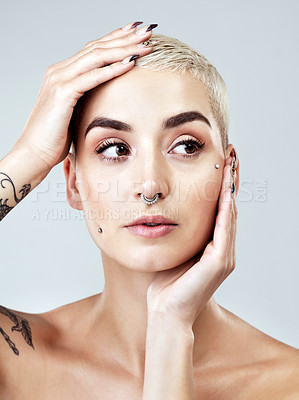 Buy stock photo Woman, thinking and tattoo with skincare in studio for natural beauty, dermatology and facial glow. Serious, person and body art with confidence for cosmetics, results and makeup on white background