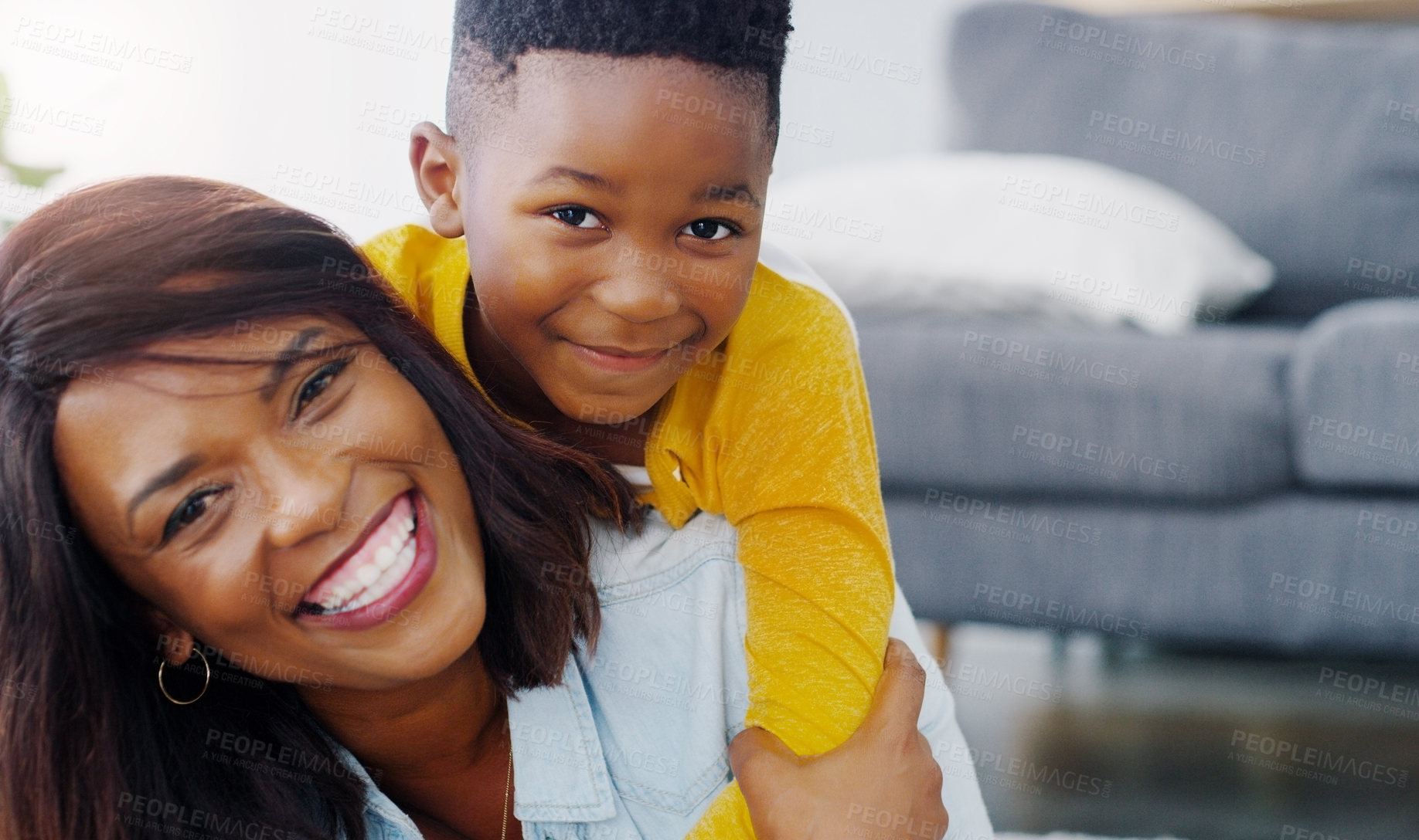 Buy stock photo Portrait of a young mother bonding and spending time with her adorable little boy at home