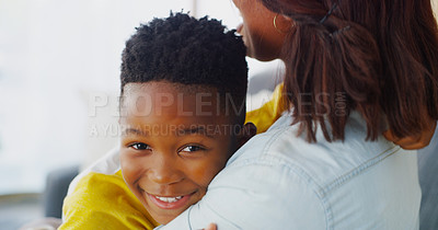 Buy stock photo Portrait of an adorable little boy bonding and spending time with his mother at home
