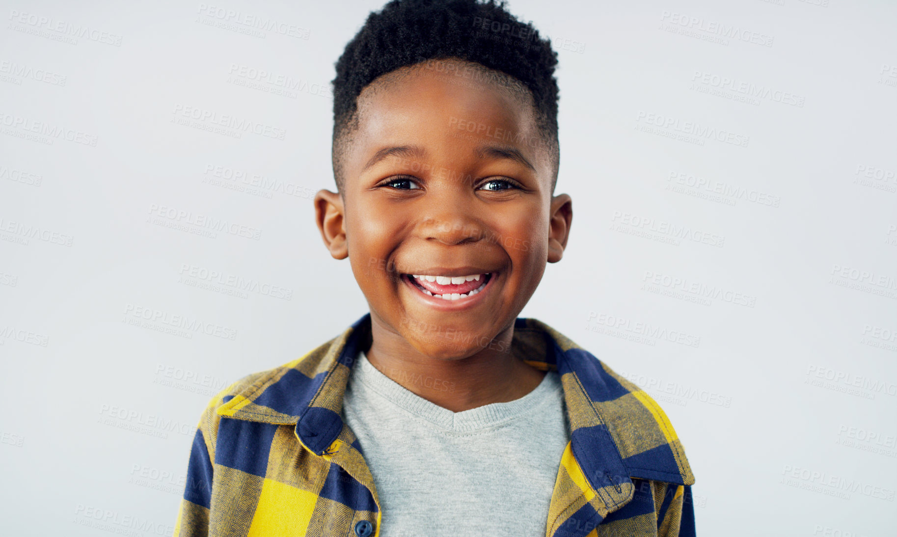 Buy stock photo Portrait, excited and black child in studio for fashion, good mood or fun. Young kid, happy and face on white background for positive energy, confidence or elementary school profile update in Nigeria