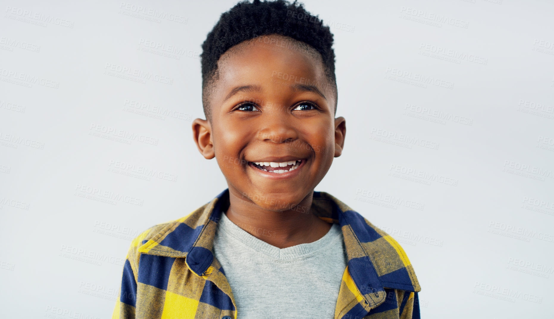 Buy stock photo Thinking, happy and black child in studio for fashion, excited and summer fun. Young kid, smile and face on white background for positive energy, good mood or school profile update in Nigeria