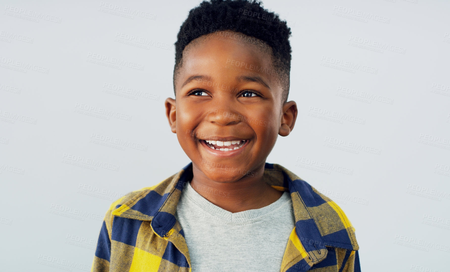 Buy stock photo Thinking, smile and black child in studio for fashion, excited and summer fun. Young kid, happy and idea on white background for positive energy, confident or school profile update in Nigeria