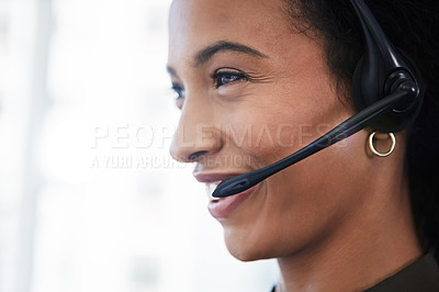 Buy stock photo Shot of a young woman using a headset in a modern office