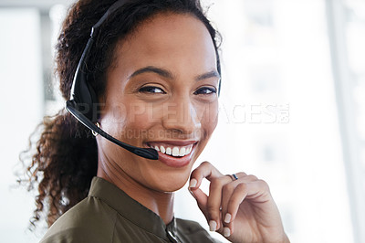 Buy stock photo Shot of a young woman using a headset in a modern office