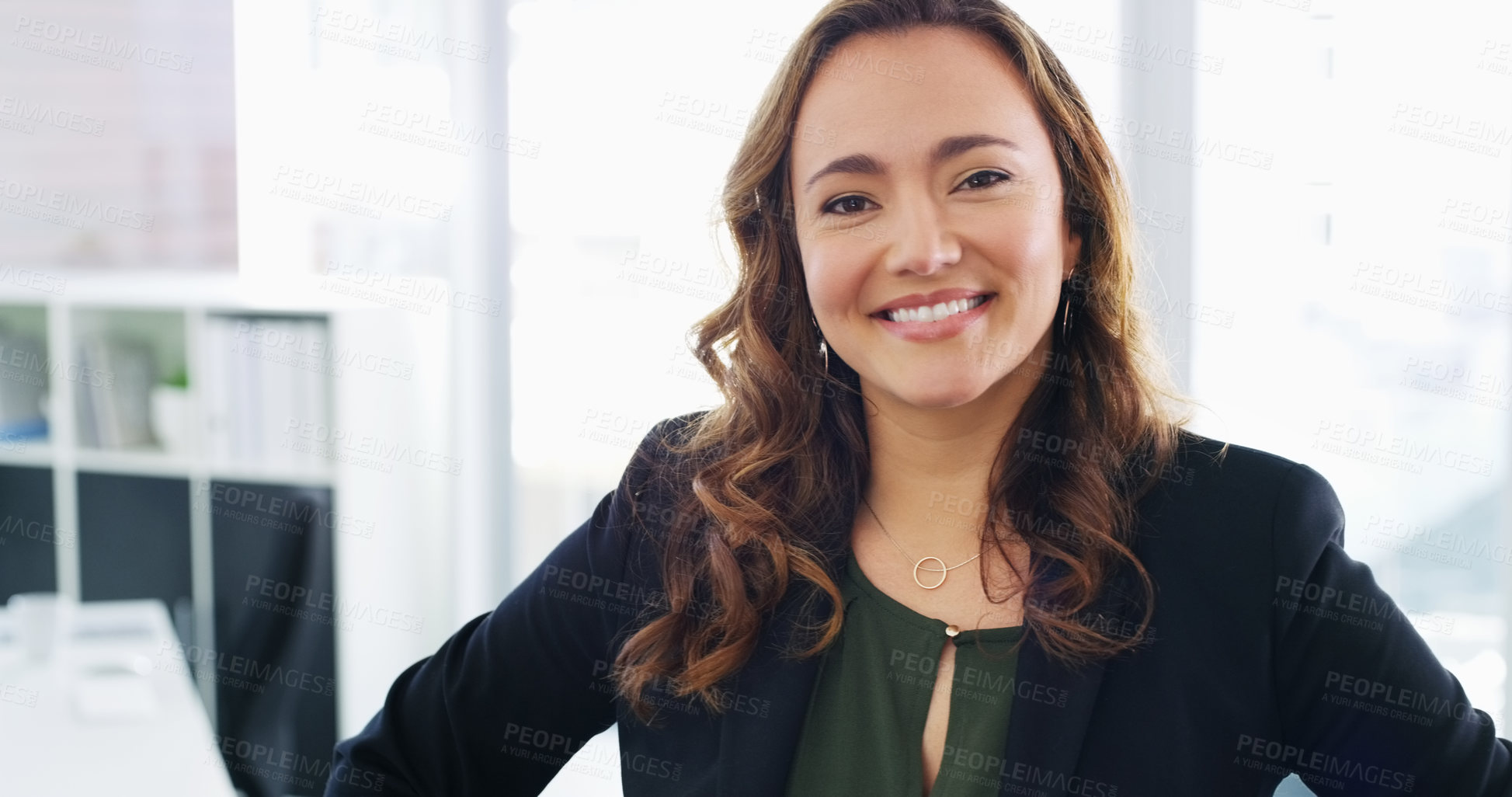 Buy stock photo Portrait of a confident young businesswoman working in a modern office