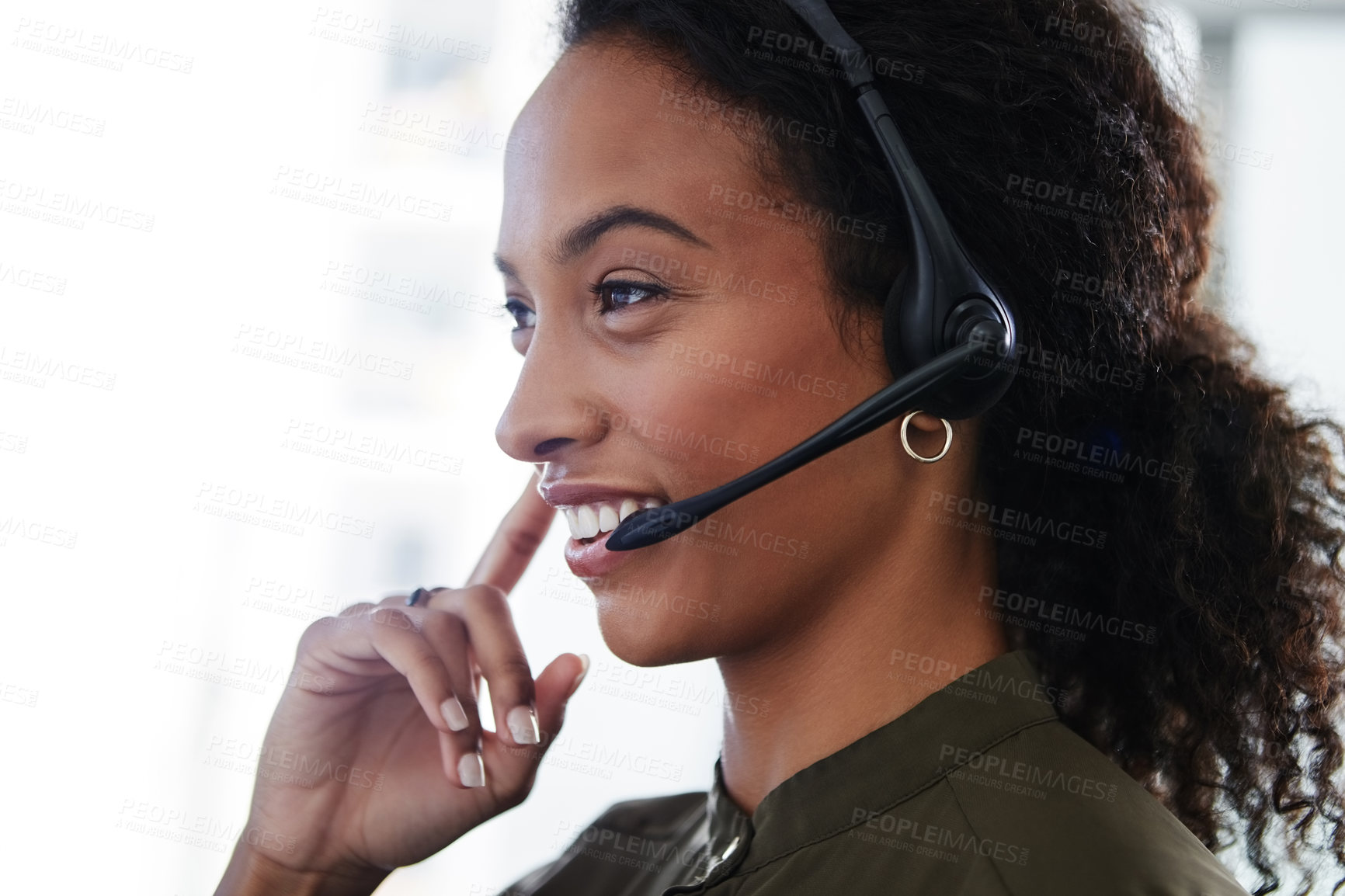 Buy stock photo Shot of a young woman using a headset in a modern office