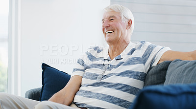 Buy stock photo Shot of a senior man relaxing on the sofa at home