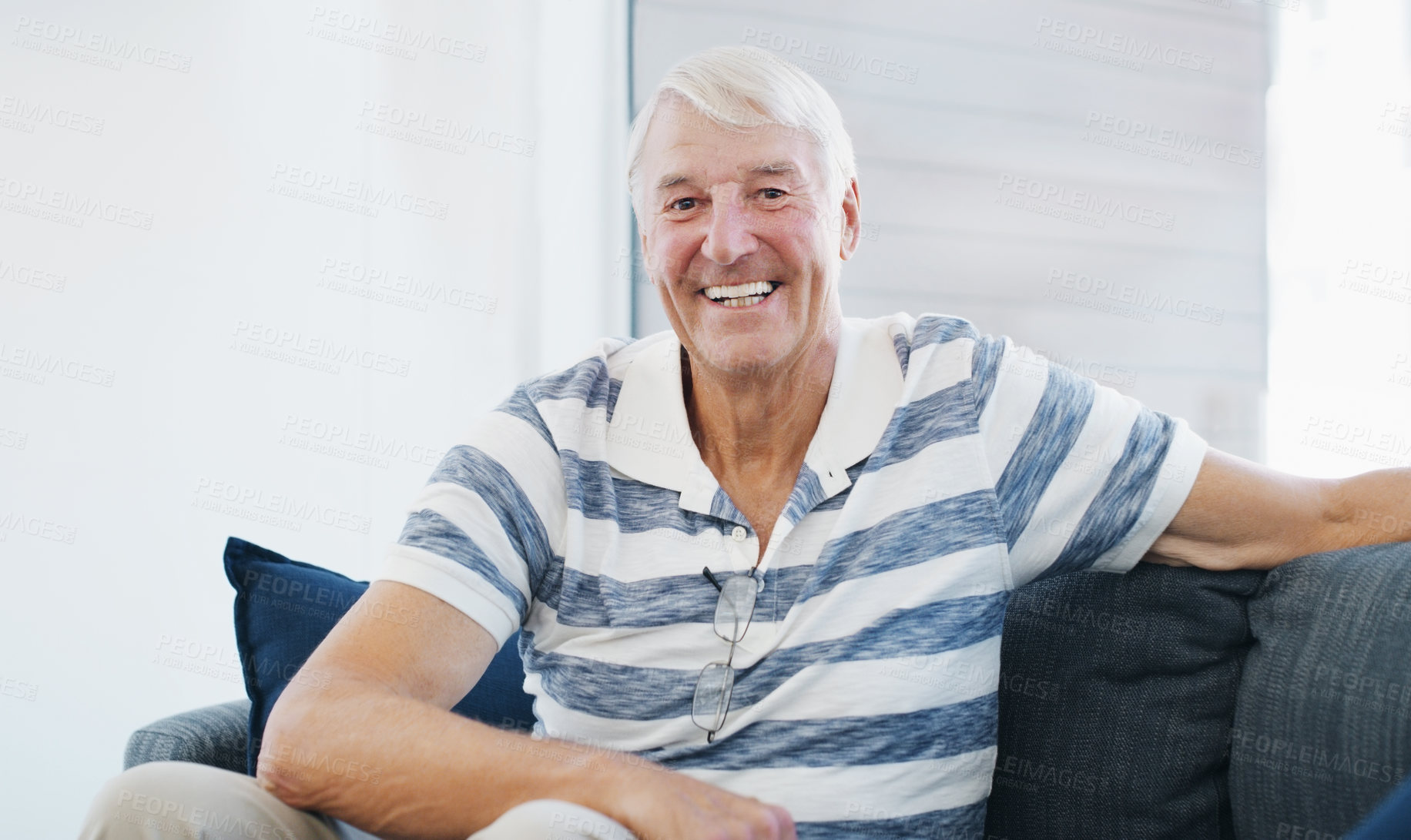 Buy stock photo Shot of a senior man relaxing on the sofa at home