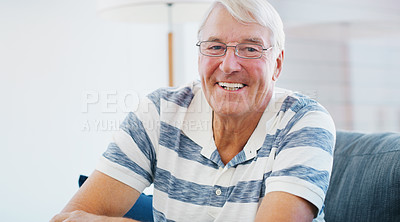 Buy stock photo Shot of a senior man relaxing on the sofa at home