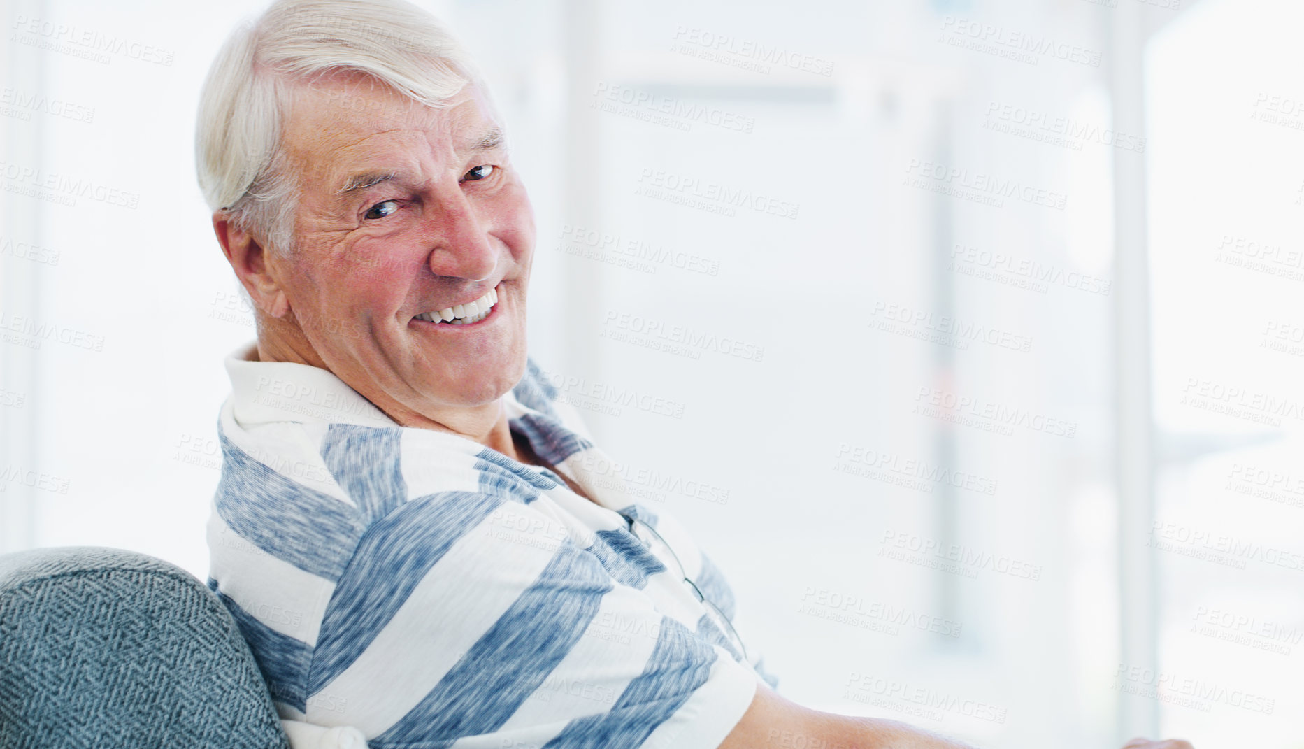 Buy stock photo Shot of a senior man relaxing on the sofa at home