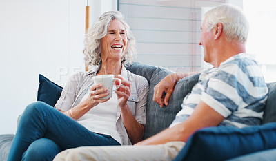 Buy stock photo Mature couple, home and happy with coffee on sofa in living room on break, bonding and relax. People, relationship and laughing for love with cup for conversation, chat and funny memories on couch