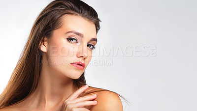 Buy stock photo Woman, beauty portrait and mockup with makeup, cosmetics and natural skin care aesthetic. Isolated, white background and young female model with mock up for skincare and dermatology in studio