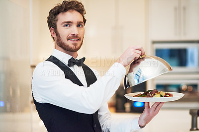Buy stock photo Catering, fine dining and man waiter portrait holding food ready for server work and service. Home chef hospitality and staff working to serve luxury household kitchen meal and dinner at night
