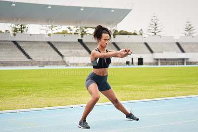 Buy stock photo Woman, athlete and stretching on track field for running, training and fitness in summer. Professional sportswoman, runner and workout in stadium for wellness, cardio and warm up for marathon 
