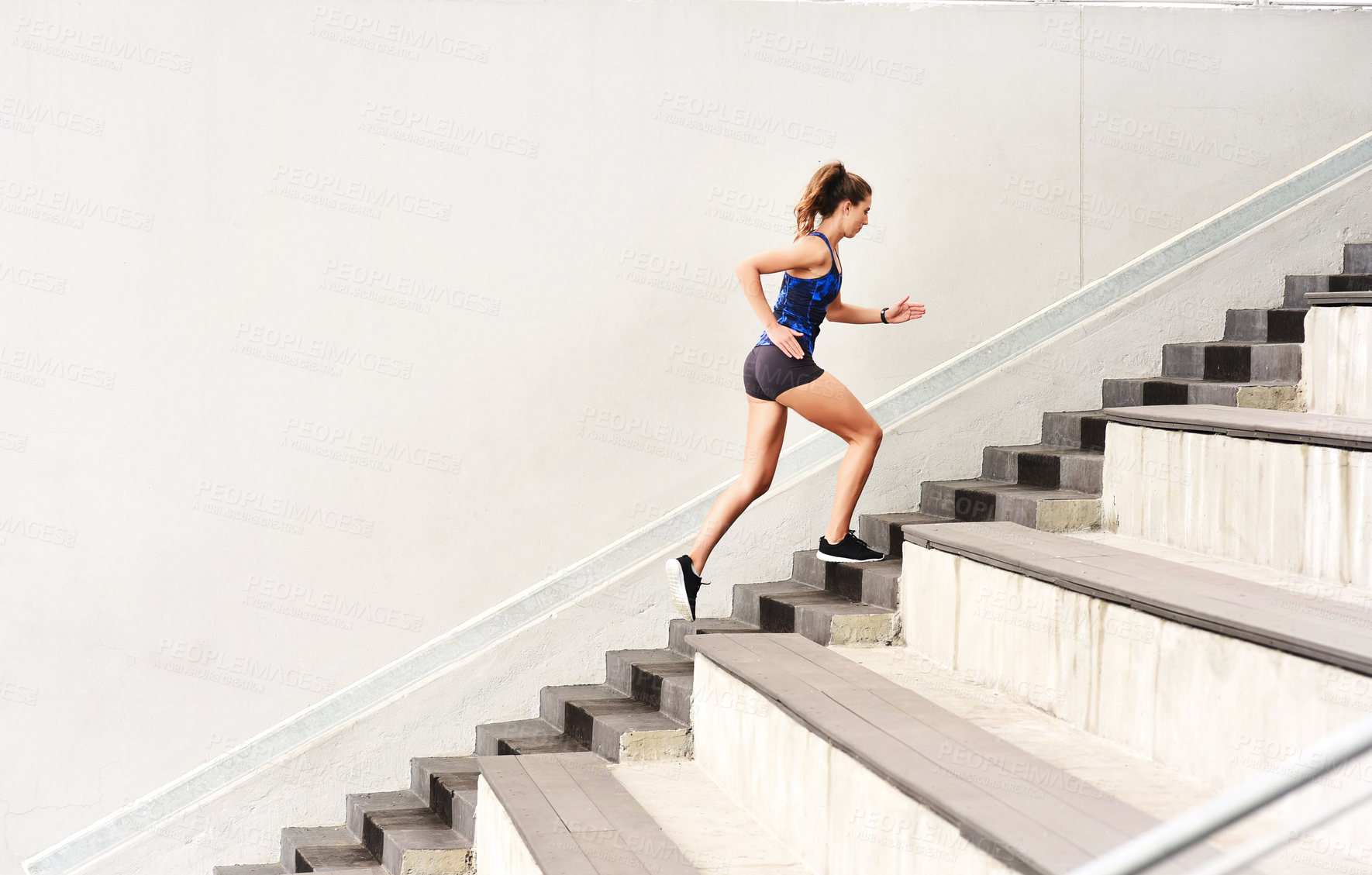 Buy stock photo Female athlete, stairs and cardio for sports, exercise and fit on steps for endurance, physical and activity. Healthy, woman and training in running, wellness and muscles for strong, body and mind