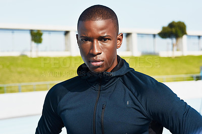 Buy stock photo Portrait, black man and runner at stadium for fitness, wellness or exercise for body health in Nigeria. Face, serious person or athlete at race track for sports, workout or training outdoor in Africa