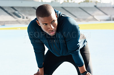 Buy stock photo Fitness, running and tired with sports black man in stadium venue for competition or performance. Exercise, fatigue and training with athlete or runner in recovery from outdoor marathon or race