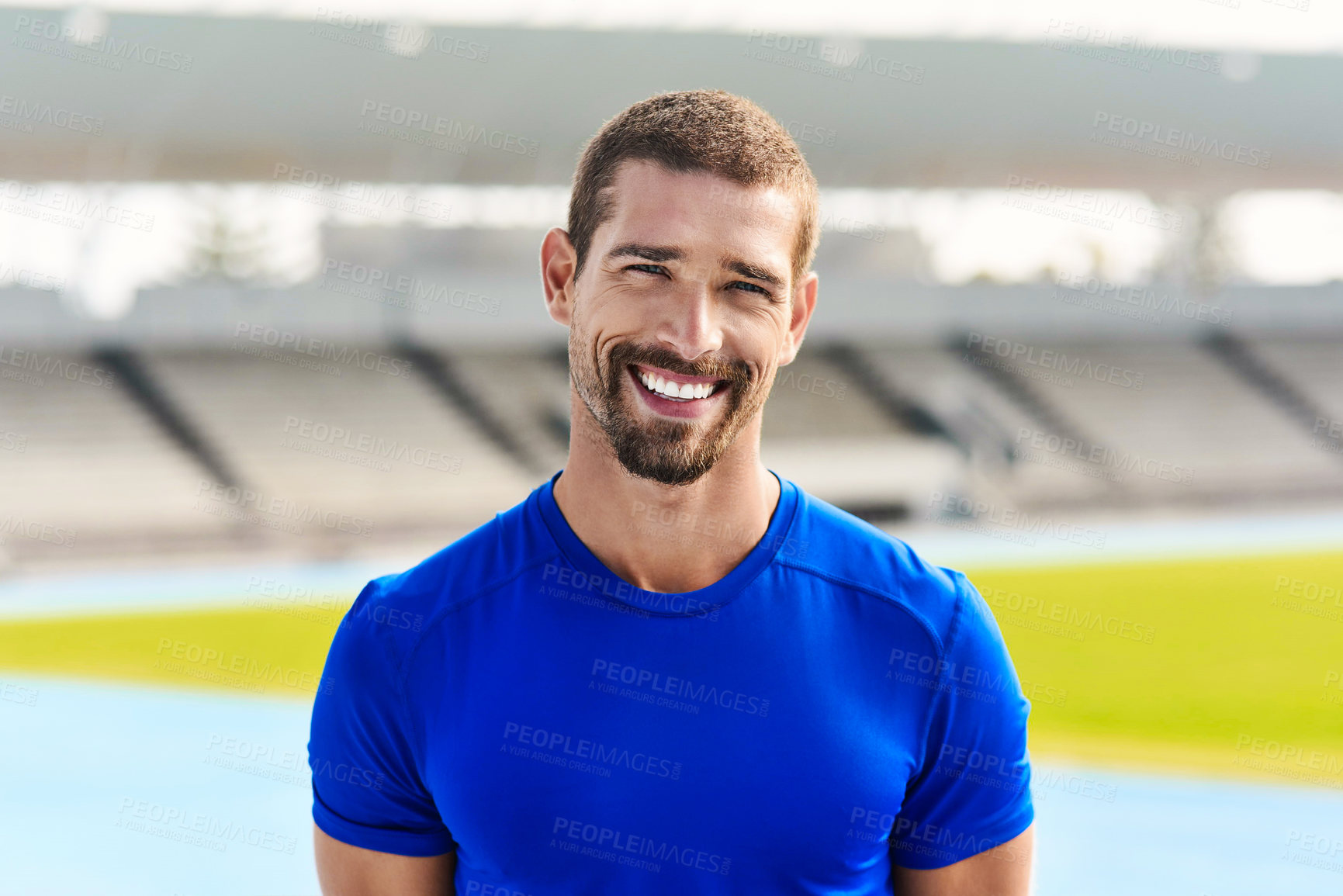 Buy stock photo Portrait, happy man and athlete at stadium for sport, wellness or exercise for body health in USA. Face, smile and runner at race track for fitness, workout or person training outdoor at summer field