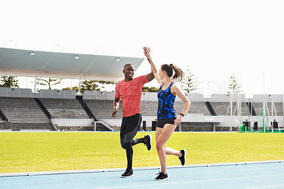 Buy stock photo High five, sports and teamwork on outdoor track, celebrate and winners of running competition. Athletes, happy people and together for fitness at stadium, cardio and success at practice or training