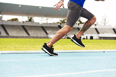 Buy stock photo Legs, running and exercise in stadium for marathon with race competition, cardio workout and health. Athlete, outdoor training and speed at run track for fitness action, strong body and sports event