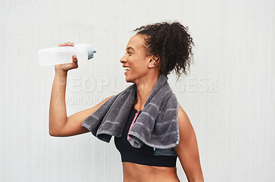 Buy stock photo Black woman, athlete and drinking water in studio, training and hydration after workout on white background. Female person, profile and liquid for recovery after exercise, fitness and mockup space