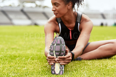 Buy stock photo Woman, hands and athlete stretching legs on grass at stadium in preparation for running, exercise or workout. Active or fit female person in warm up leg stretch for fitness, sports or run on field