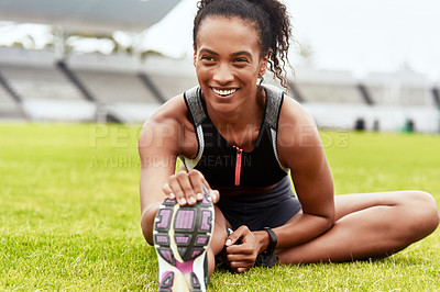 Buy stock photo Happy woman, smile and stretching legs on grass at stadium in preparation for running, exercise or workout. African female person smiling in warm up leg stretch for fitness, sports or run on a field
