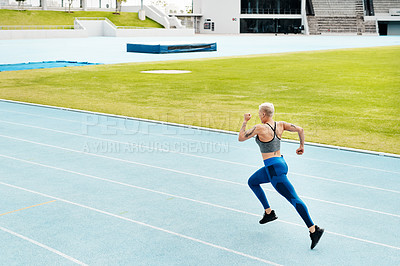 Buy stock photo Woman, race and athlete running track on stadium for exercise, cardio training or workout outdoors. Fit, active or sporty female person or runner in sports fitness, run or athletics for wellness