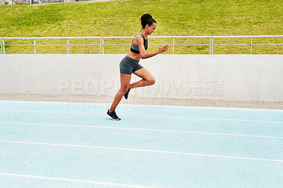Buy stock photo Woman, cardio and running on stadium track for training, physical exercise or workout. Active, fit or sporty female person, athlete or runner in sports run, race or competition for healthy wellness