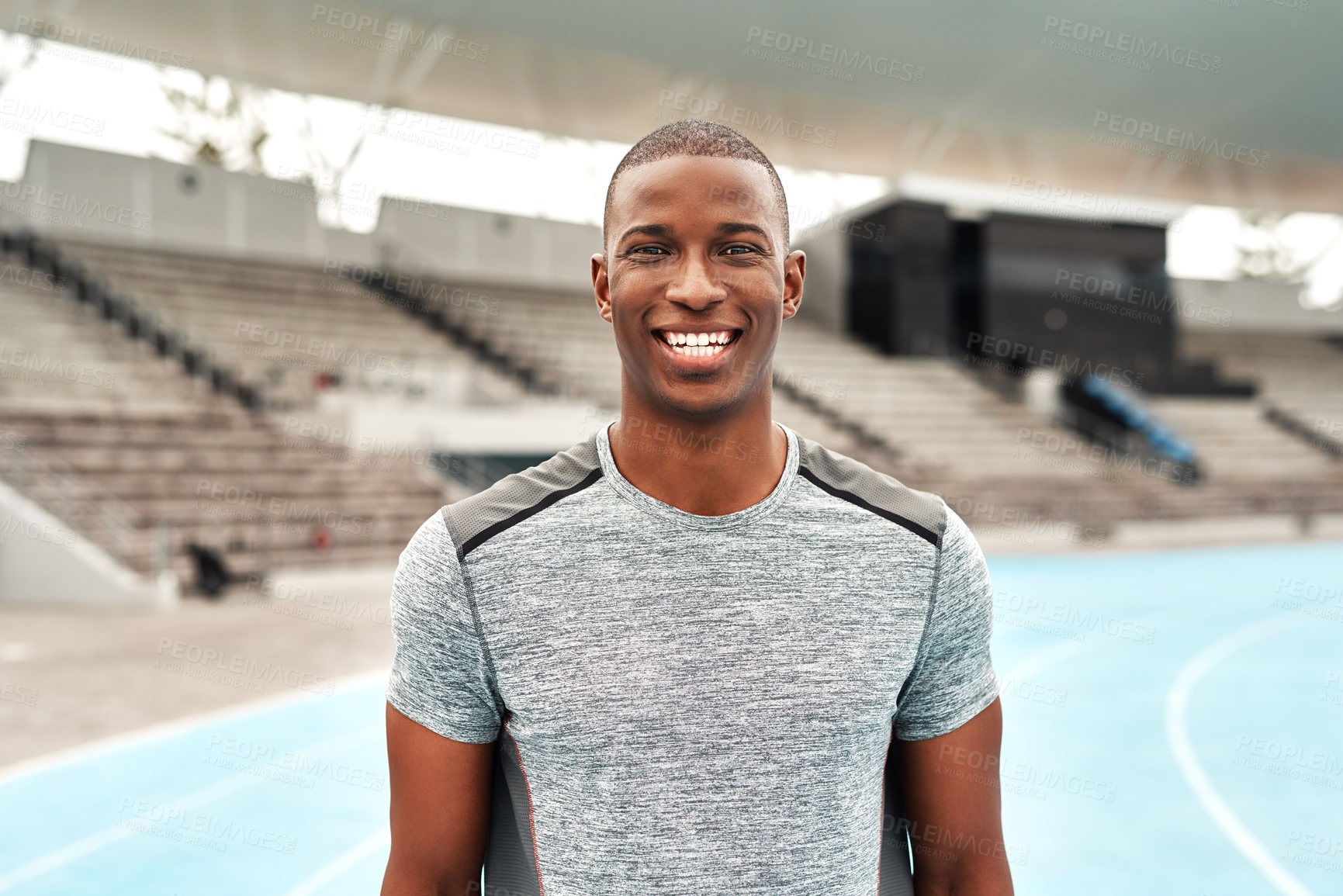 Buy stock photo Confident, black man or athlete portrait on stadium track for fitness, running and training for competition. Male person, sportswear and outdoor on marathon field for workout, exercise and health