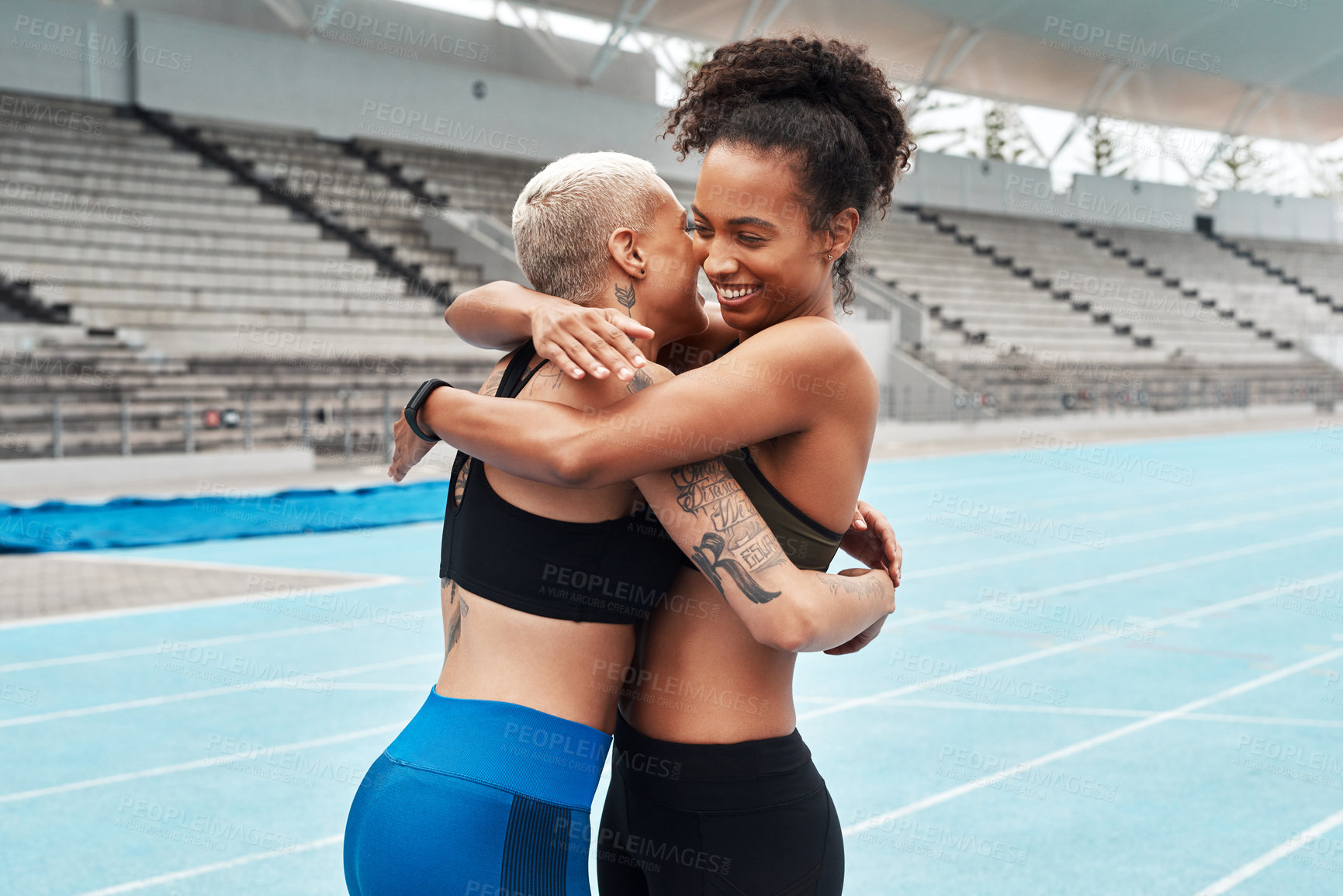 Buy stock photo Runners, women or friends hug on track for winning record in running, exercise or fitness workout in stadium. Success, goal target or sports athletes in competition training for achievement or prize