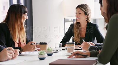 Buy stock photo Shot of a group of businesspeople having a meeting in a boardroom