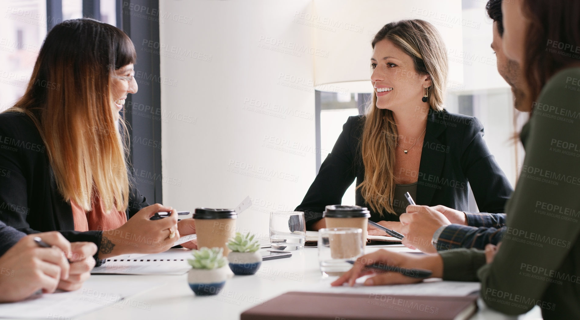 Buy stock photo Shot of a group of businesspeople having a meeting in a boardroom