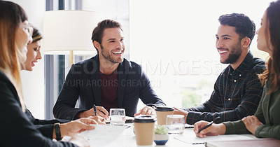 Buy stock photo Shot of a group of businesspeople having a meeting in a boardroom