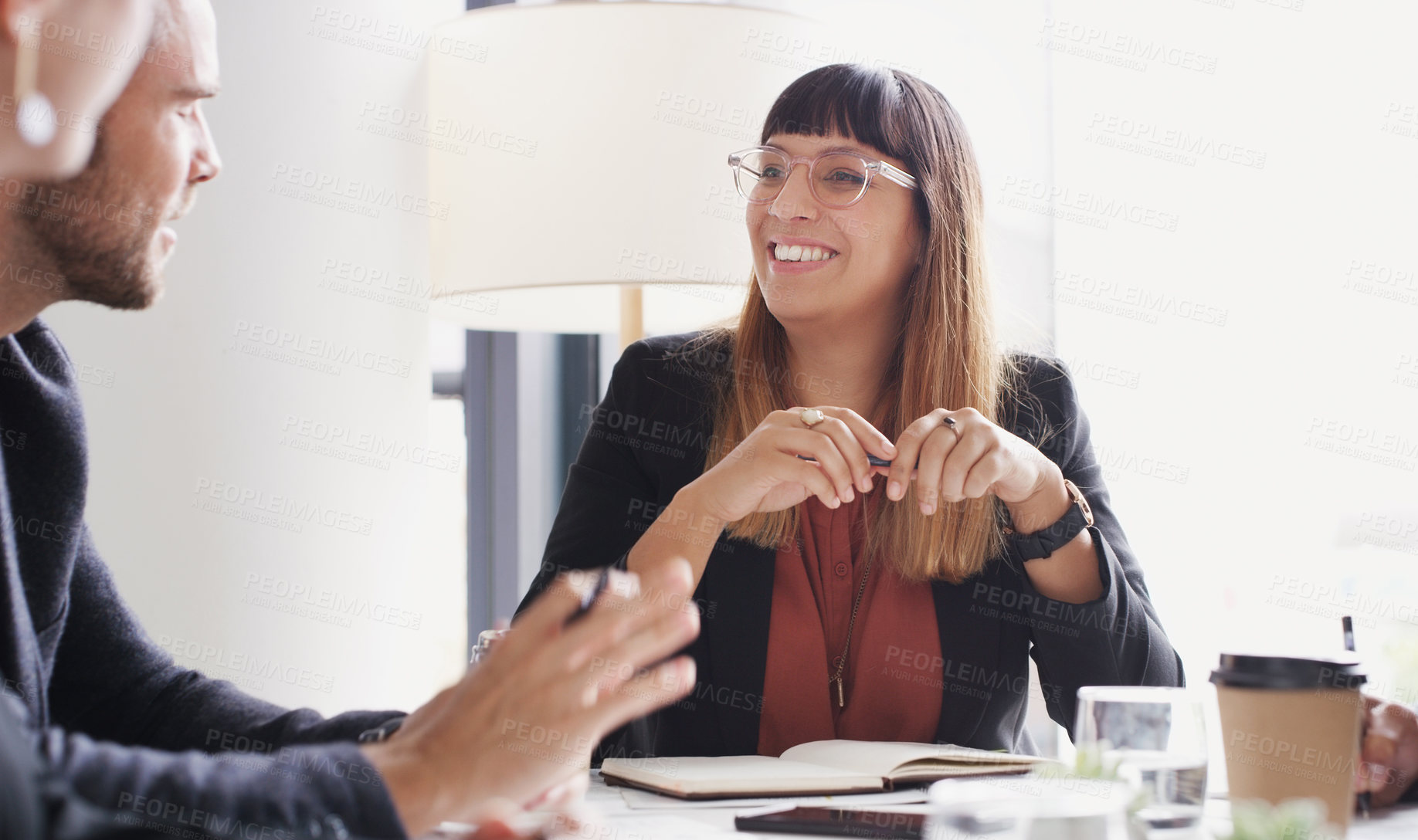 Buy stock photo Shot of a group of businesspeople having a meeting in a boardroom