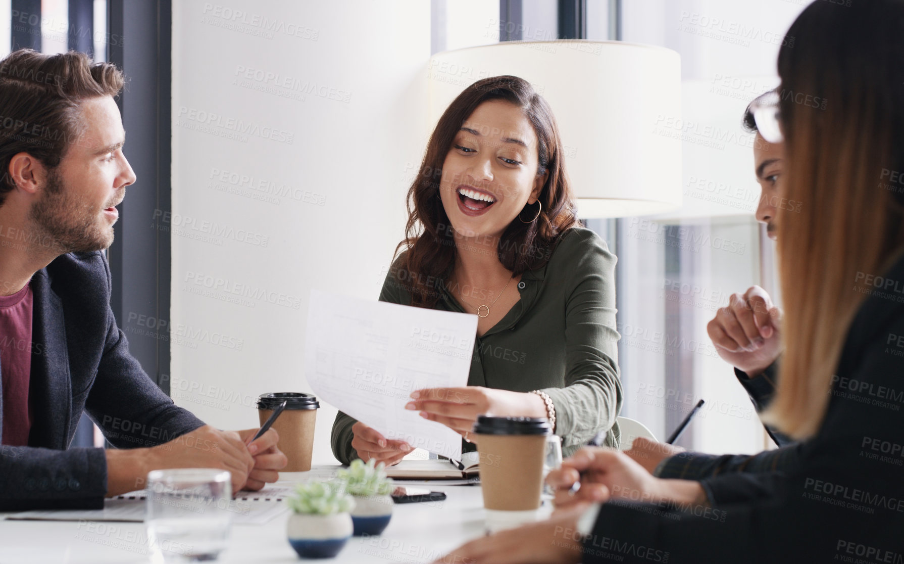 Buy stock photo Shot of a group of businesspeople having a meeting in a boardroom