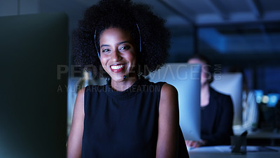 Buy stock photo Cropped portrait of an attractive young businesswoman wearing a headset and sitting in the office late at night