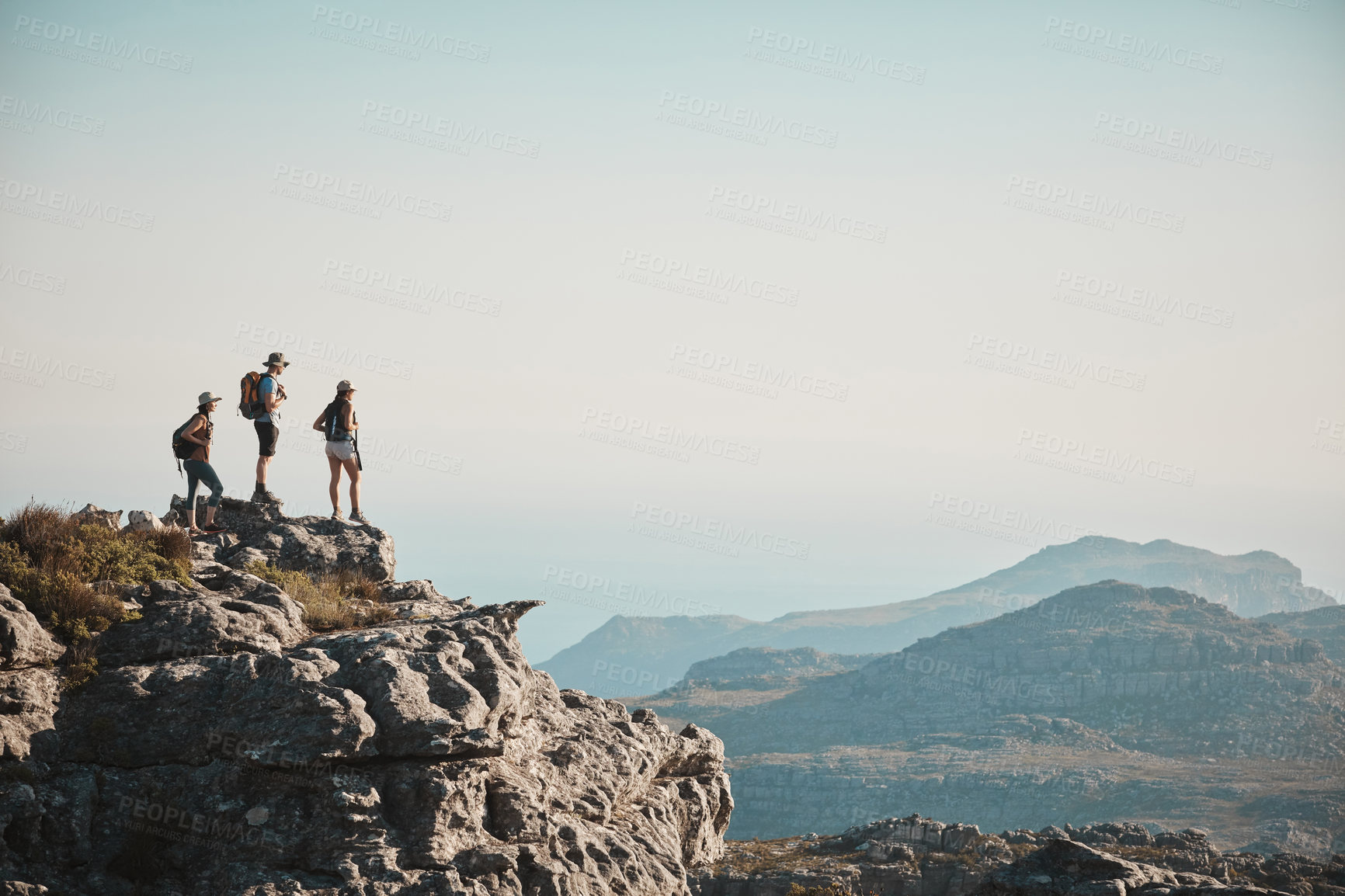 Buy stock photo Friends, mountain and hiking on cliff outdoor for fitness travel, adventure space or backpack journey in summer. People, sky and trekking together for cardio exercise, rock climbing and health mockup