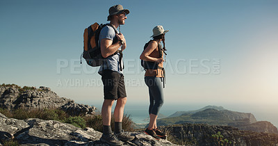 Buy stock photo Mountain, hiking and man with woman on peak for adventure in nature, landscape and travel. Outdoor trekking, couple on cliff and relax in scenic view for natural journey, walking and looking