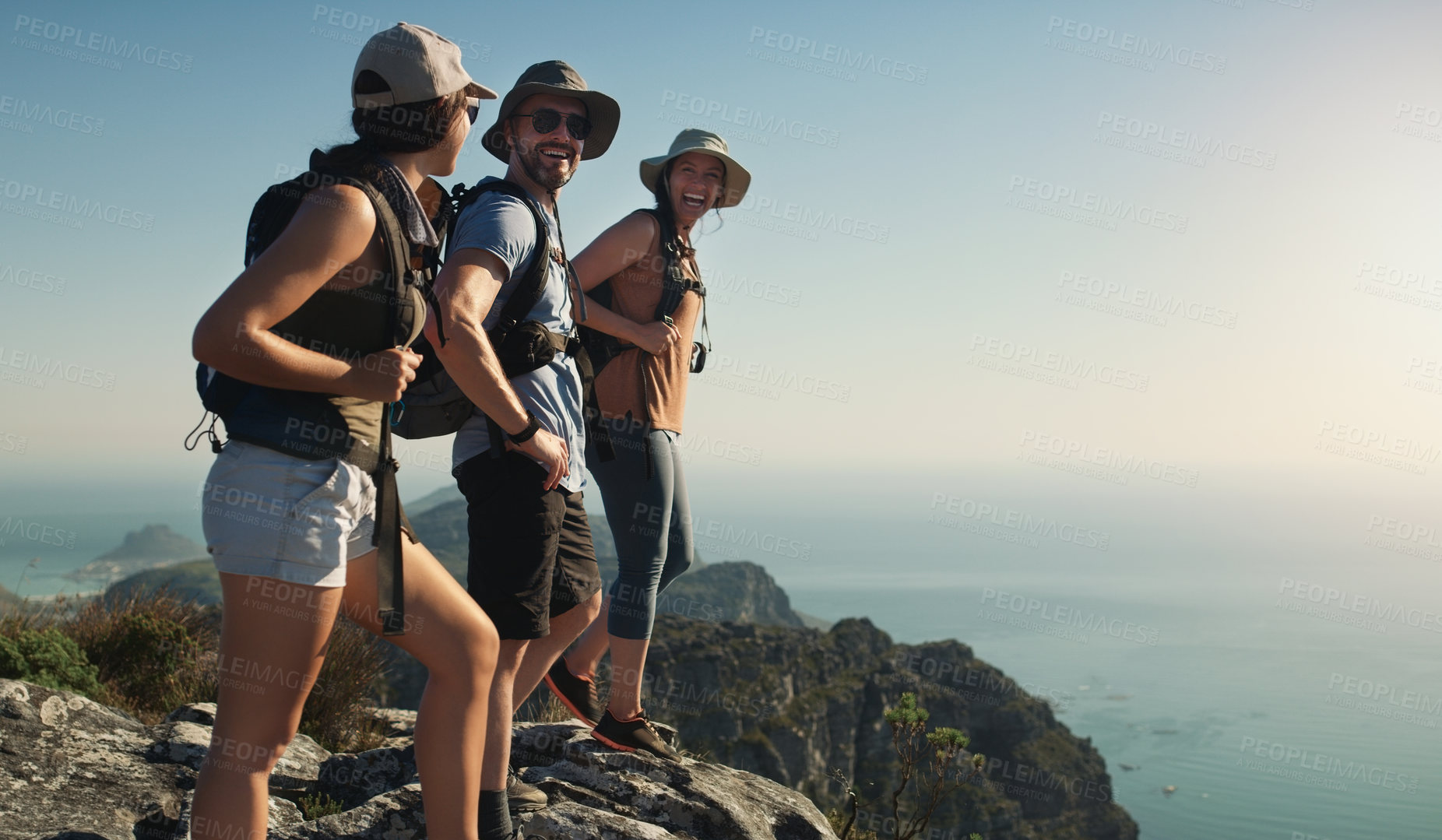 Buy stock photo Mountain, hiking and friends on cliff outdoor of fitness travel, adventure view and backpack journey. People, backpacking and trekking together for cardio exercise, rock climbing and health in summer