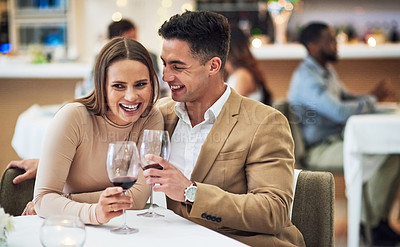 Buy stock photo Love, wine and happy couple at a restaurant for valentines day, celebration and bonding while laughing. Alcohol, fine dining and woman with funny man on first date, anniversary or birthday dinner 