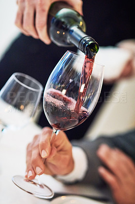Buy stock photo Hands, glass and waiter pouring wine for serving, catering or working at restaurant for customer service. Hand of diner worker providing alcohol in champagne glasses for hospitality or fine dining