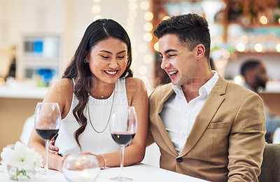 Buy stock photo Love, couple and in restaurant with smile, celebration and quality time together, happiness and affection. Romance, man and woman with fine dining, wine glasses and romantic with bonding and loving