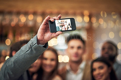 Buy stock photo Selfie, event or party group of people in restaurant for happy night celebration, mobile influencer and bokeh lights. Profile picture, hand holding and smartphone screen of friends for social media