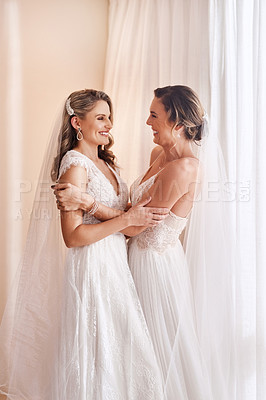 Buy stock photo Lesbian couple, bride and wedding day with embrace, together and commitment for marriage ceremony. Female people, celebration and bonding for love, happiness and gratitude as excited for partnership